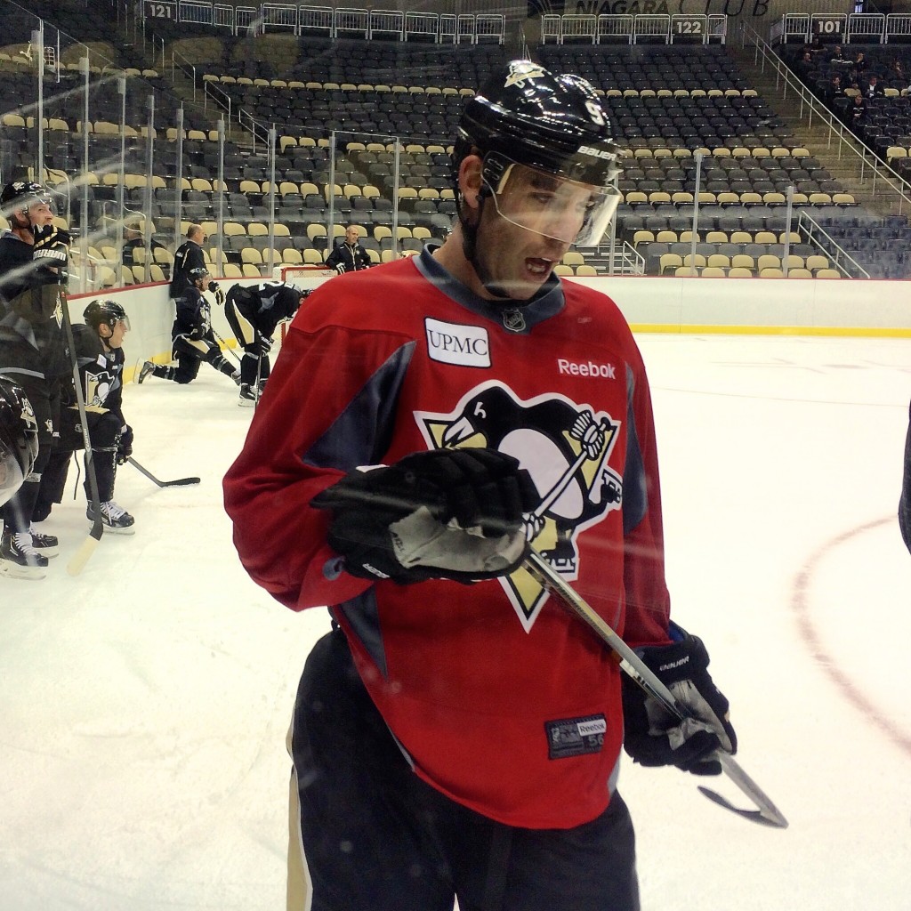 Pascal Dupuis joins a long line of Penguins visibly exhausted by rink-length sprints Friday. -- DEJAN KOVACEVIC