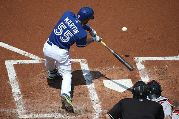 Russell Martin is off to a .297 start playing for the Blue Jays in his native Canada. -- GETTY