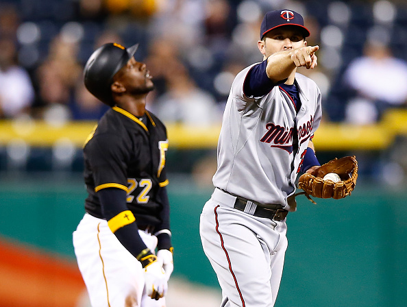 Brian Dozier reacts after batter
