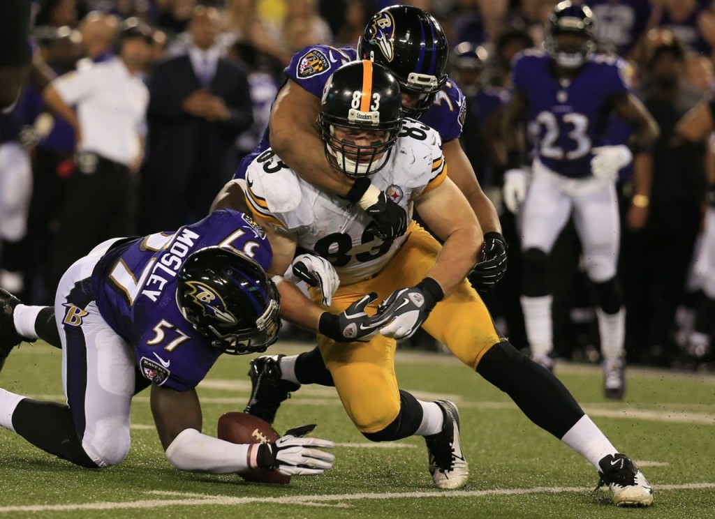 The Ravens' C.J. Mosley recovers a Heath Miller fumble in the fourth quarter. -- GETTY IMAGES