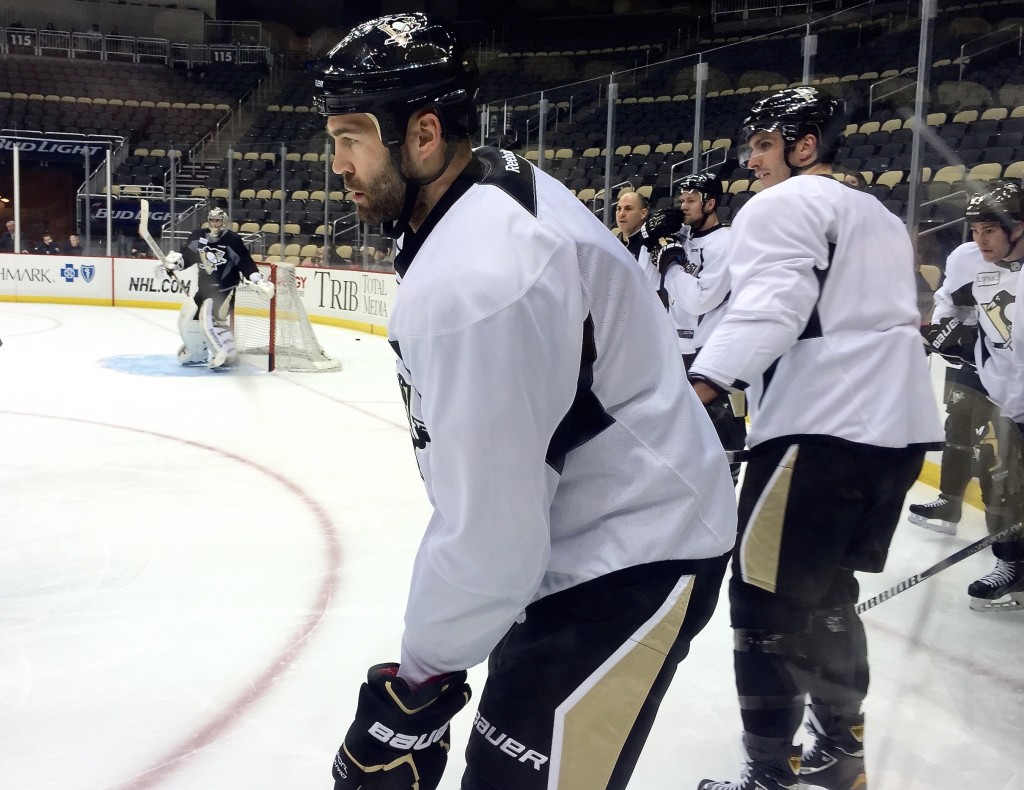 Daniel Winnik lines up for a net-front drill at the Penguins' practice Saturday at Consol. -- DEJAN KOVACEVIC